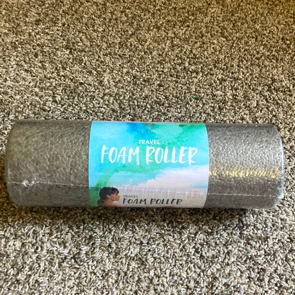 New in Sealed Package travel foam roller. Great to use to relax muscles!